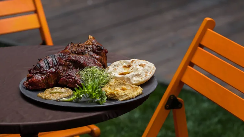 Grilled Ribeye with Eggplant Hummus and Chapati