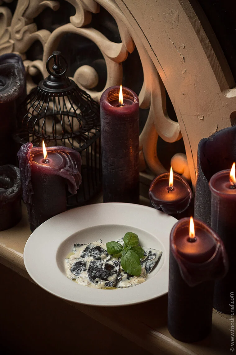 Black Squid Ink Ravioli with Salmon and Truffle Cheese Sauce